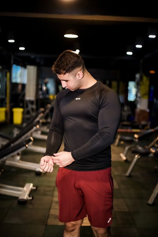 Side view of men's compression full sleeve shirt, offering flexibility and comfort