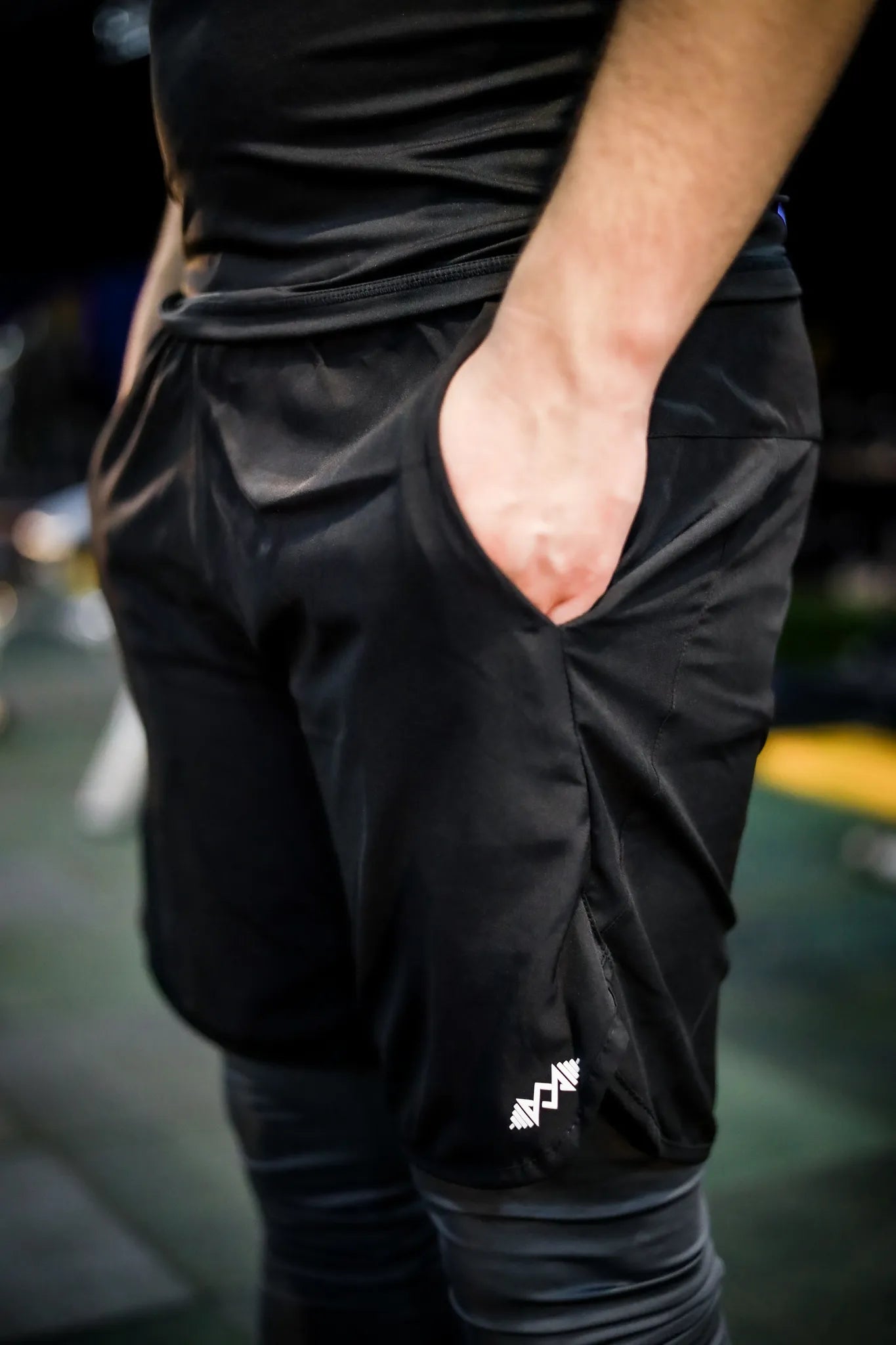 Side view of men's compression shorts in black, designed for comfort and performance