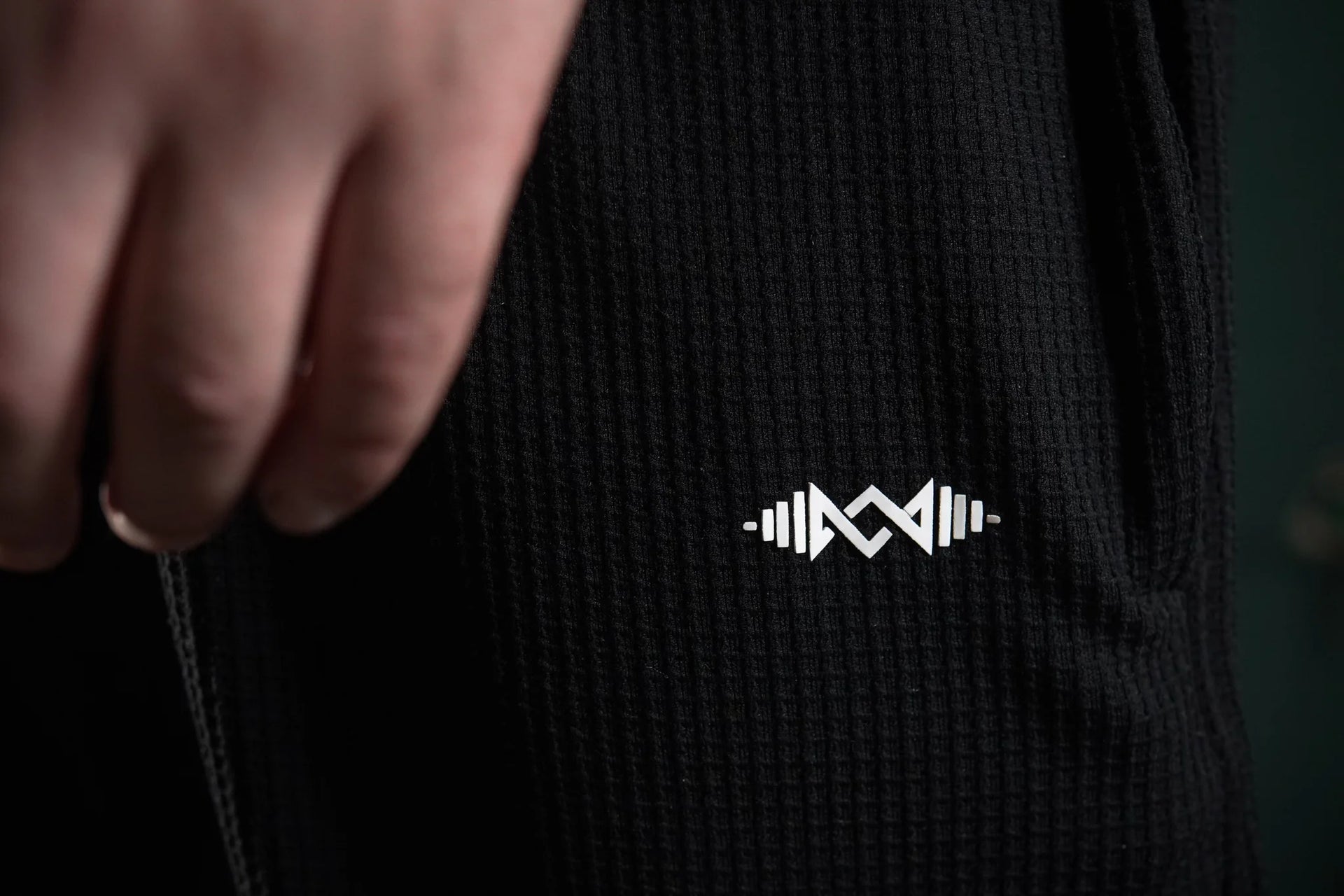 Men’s loose bottom trousers  Black close-up. Soft fabric and modern design