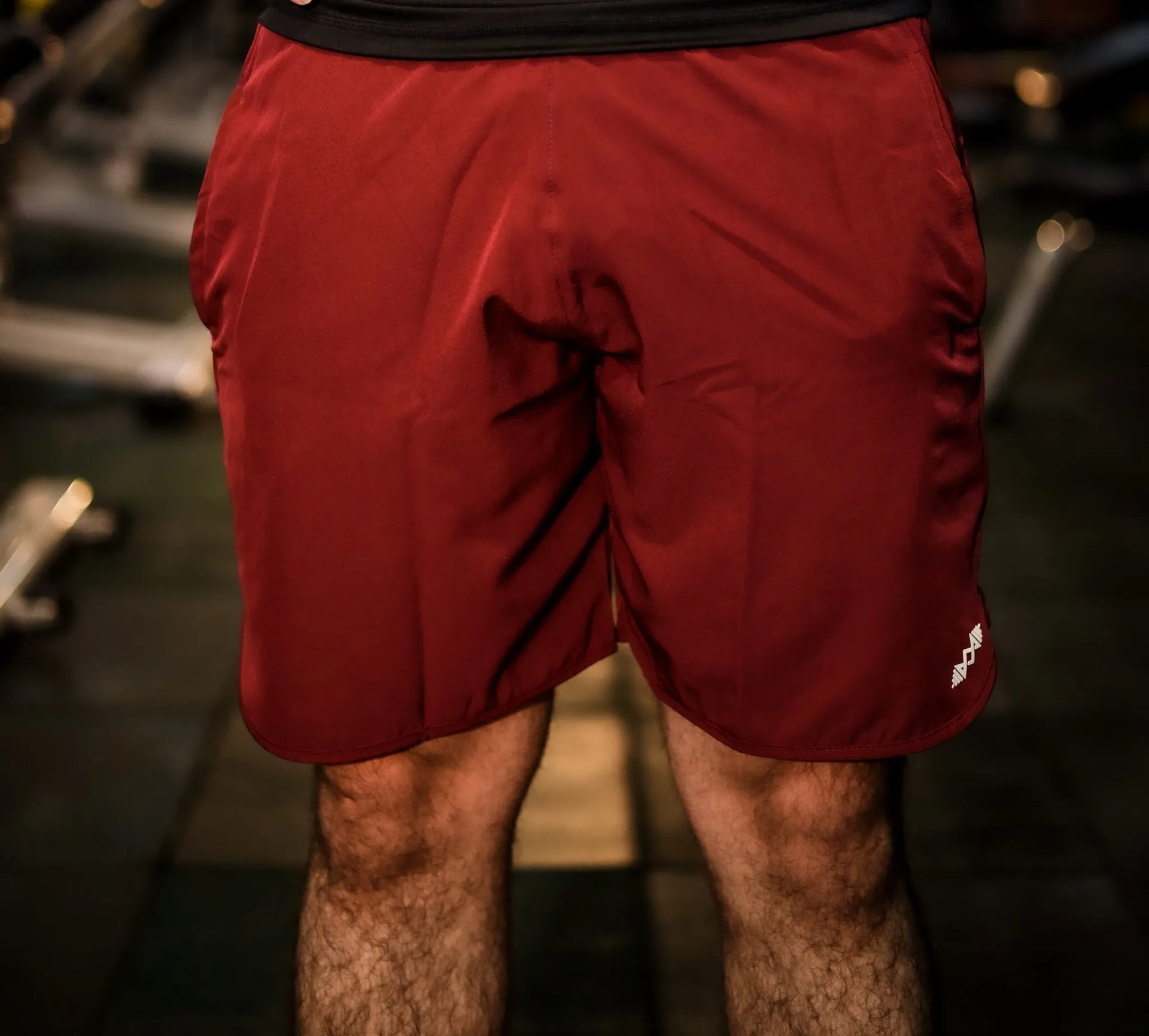 Front view of men's maroon sport shorts, perfect for gym workouts and casual wear