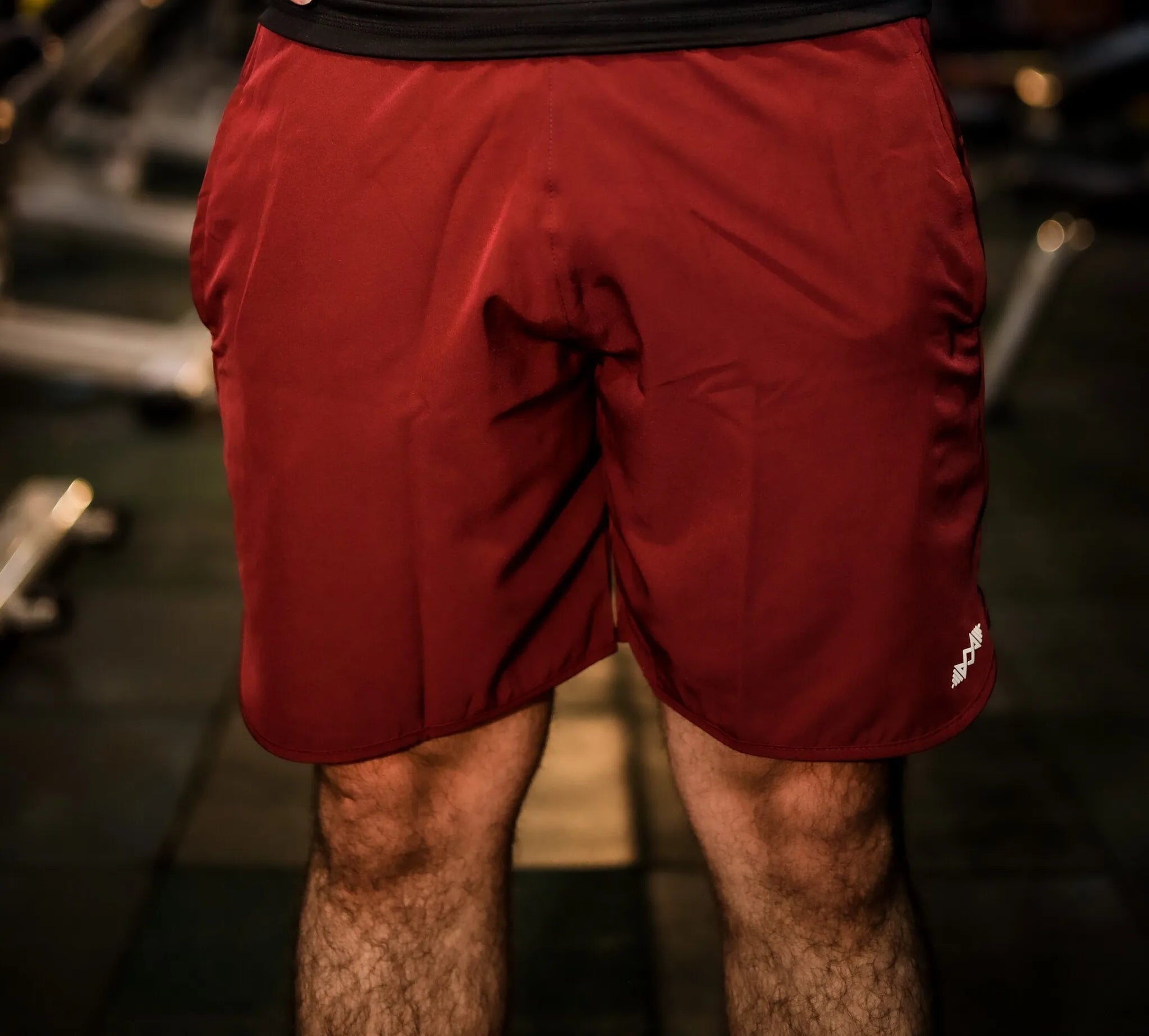 Front view of men's maroon sport shorts, perfect for gym workouts and casual wear