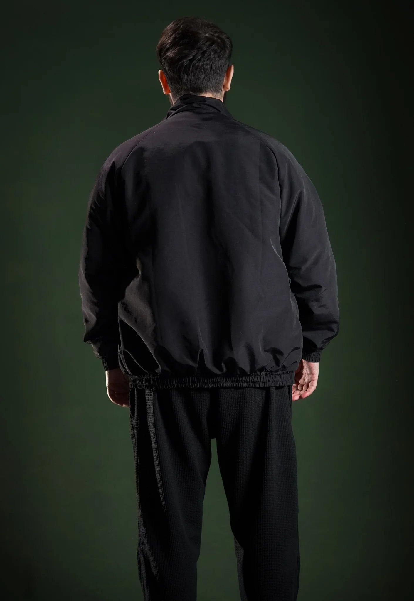 Men’s windbreaker jacket  Black back view. Comfortable and versatile for daily wear