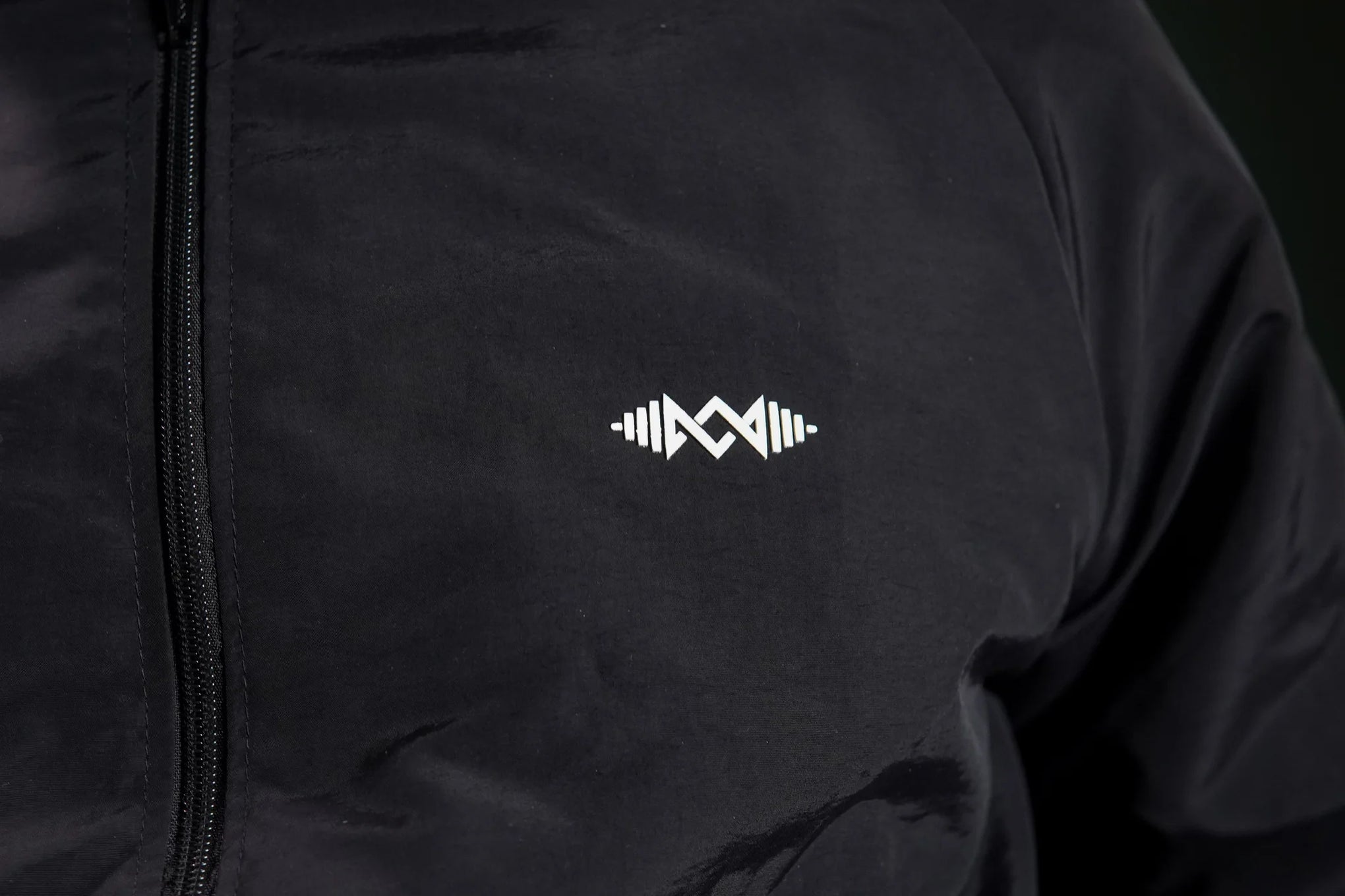 Men’s windbreaker jacket  Black close-up. Soft fabric and modern design