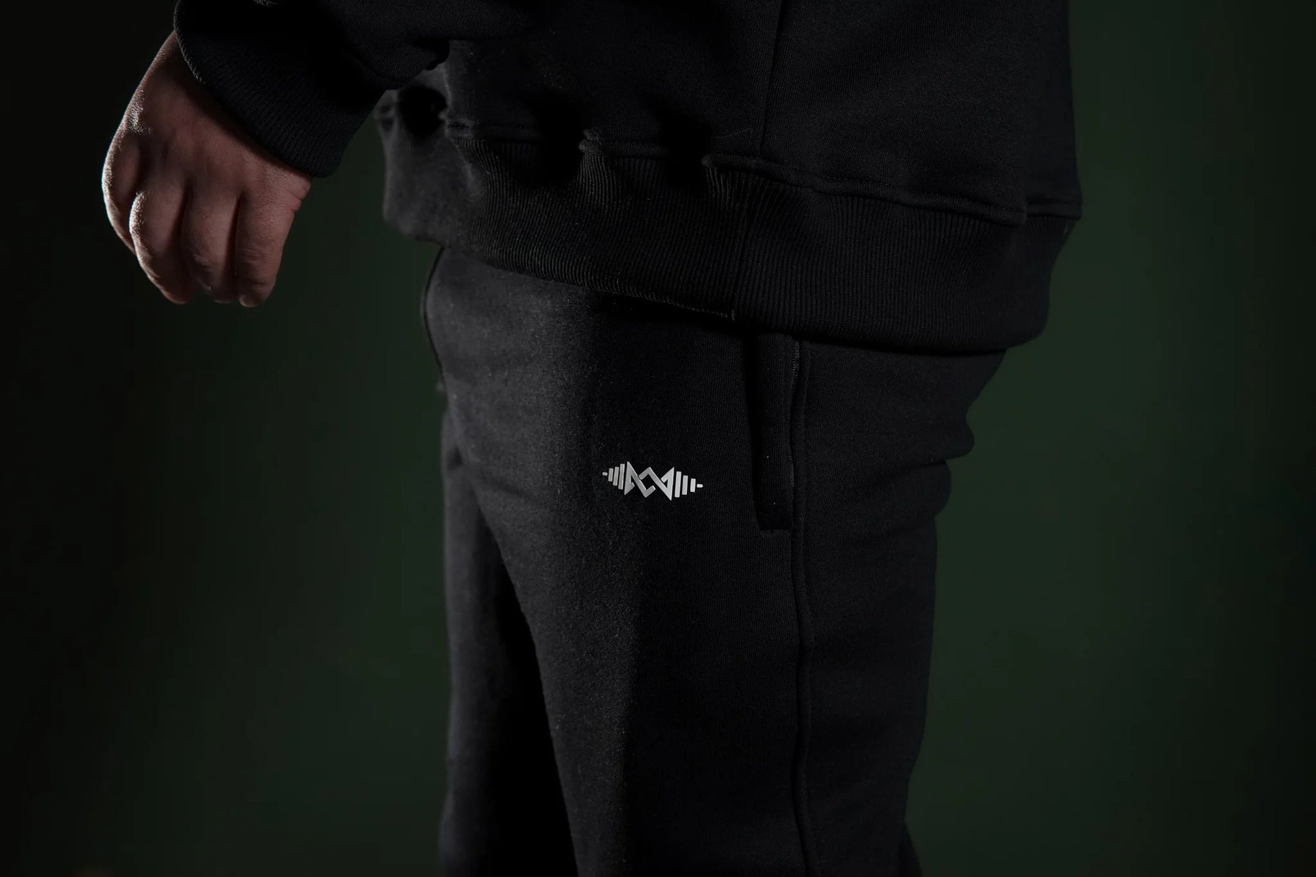 Men’s winter fleece sweatpants  Black, side view. Perfect for gym & streetwear