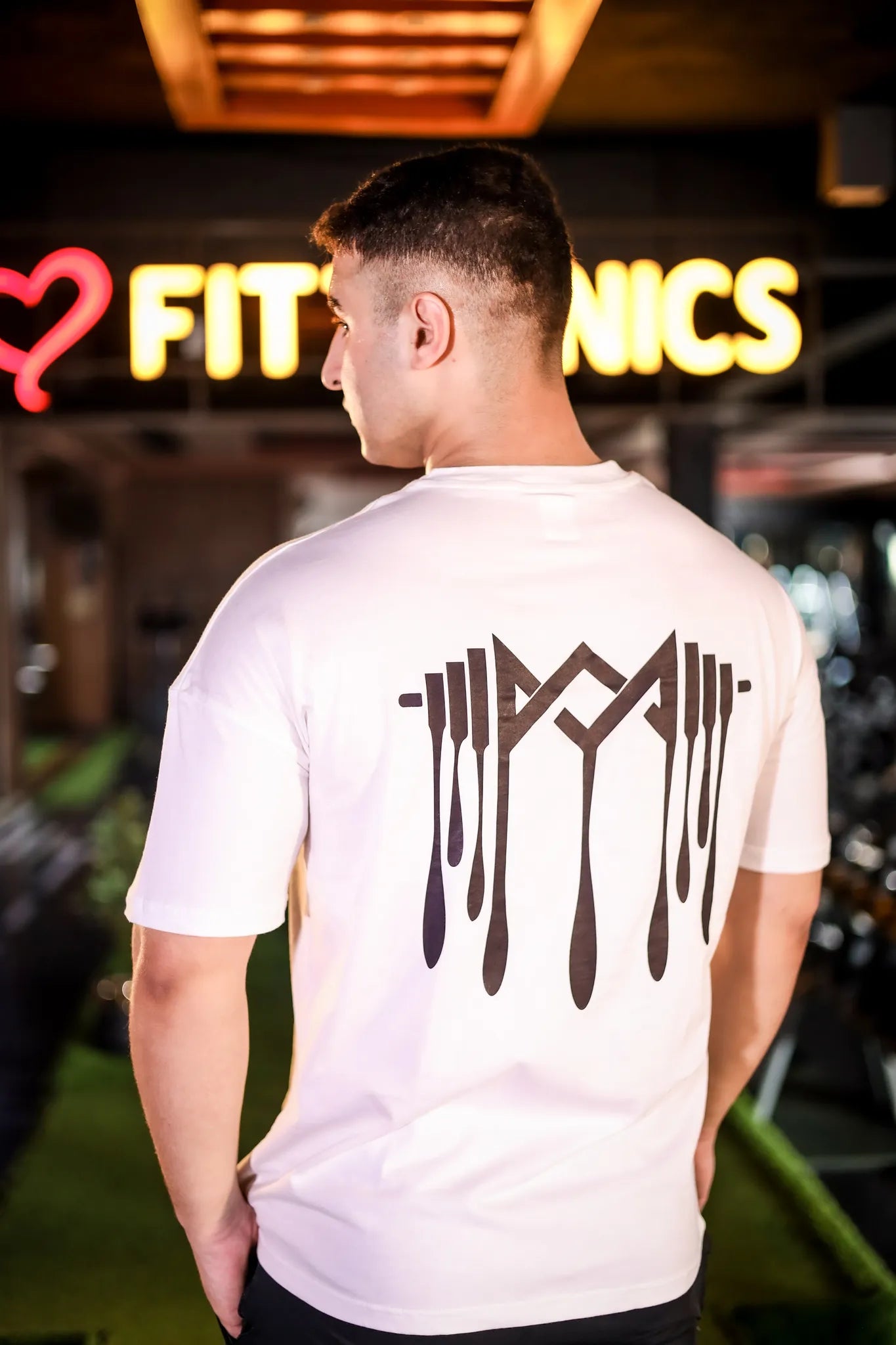 Back view of Murks Drop Shoulder Dripping T-shirt in   white, colour highlighting the bold dripping details