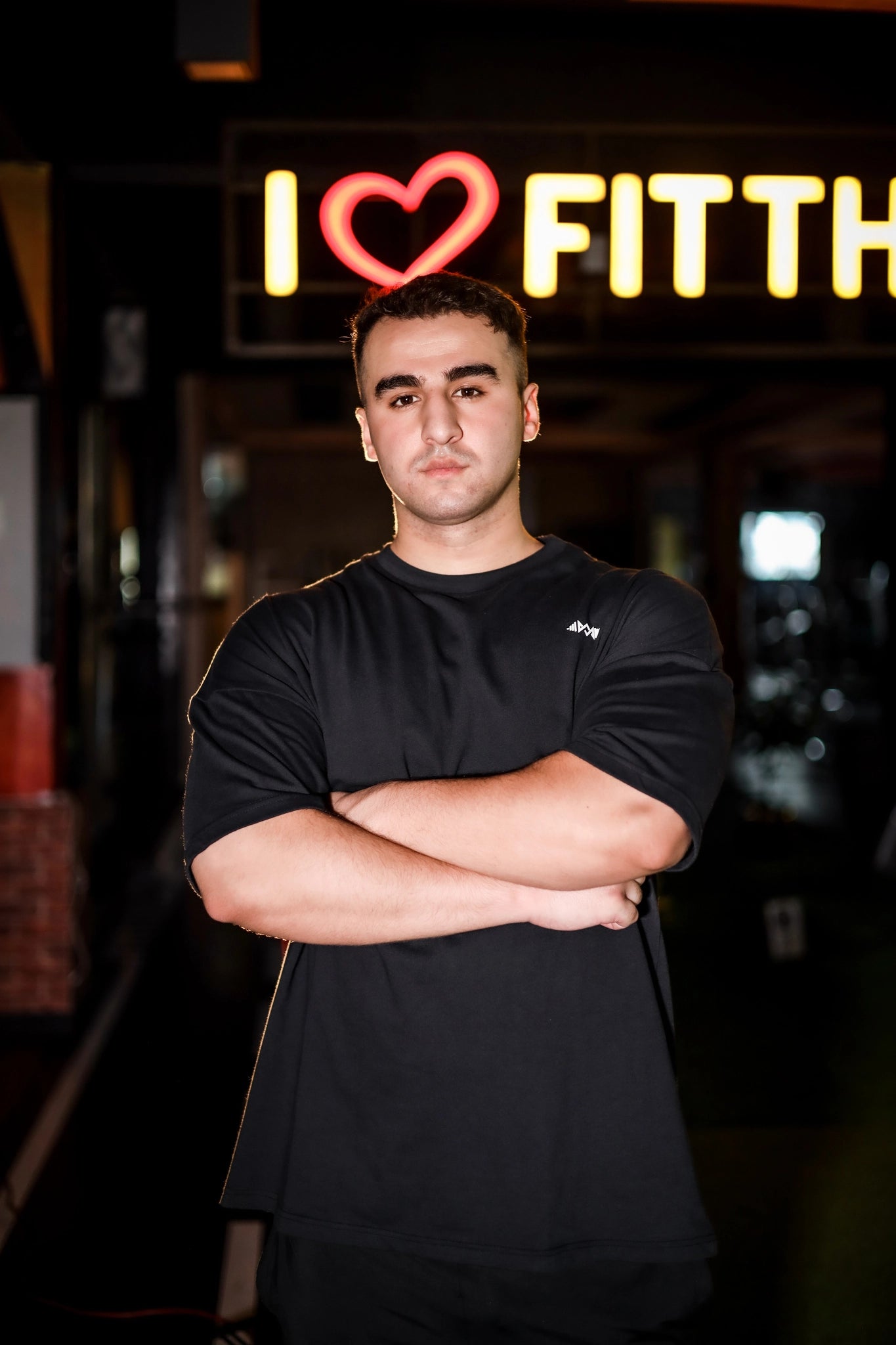 Front view of Murks Drop Shoulder Dripping T-shirt in black featuring a unique dripping design for a stylish look