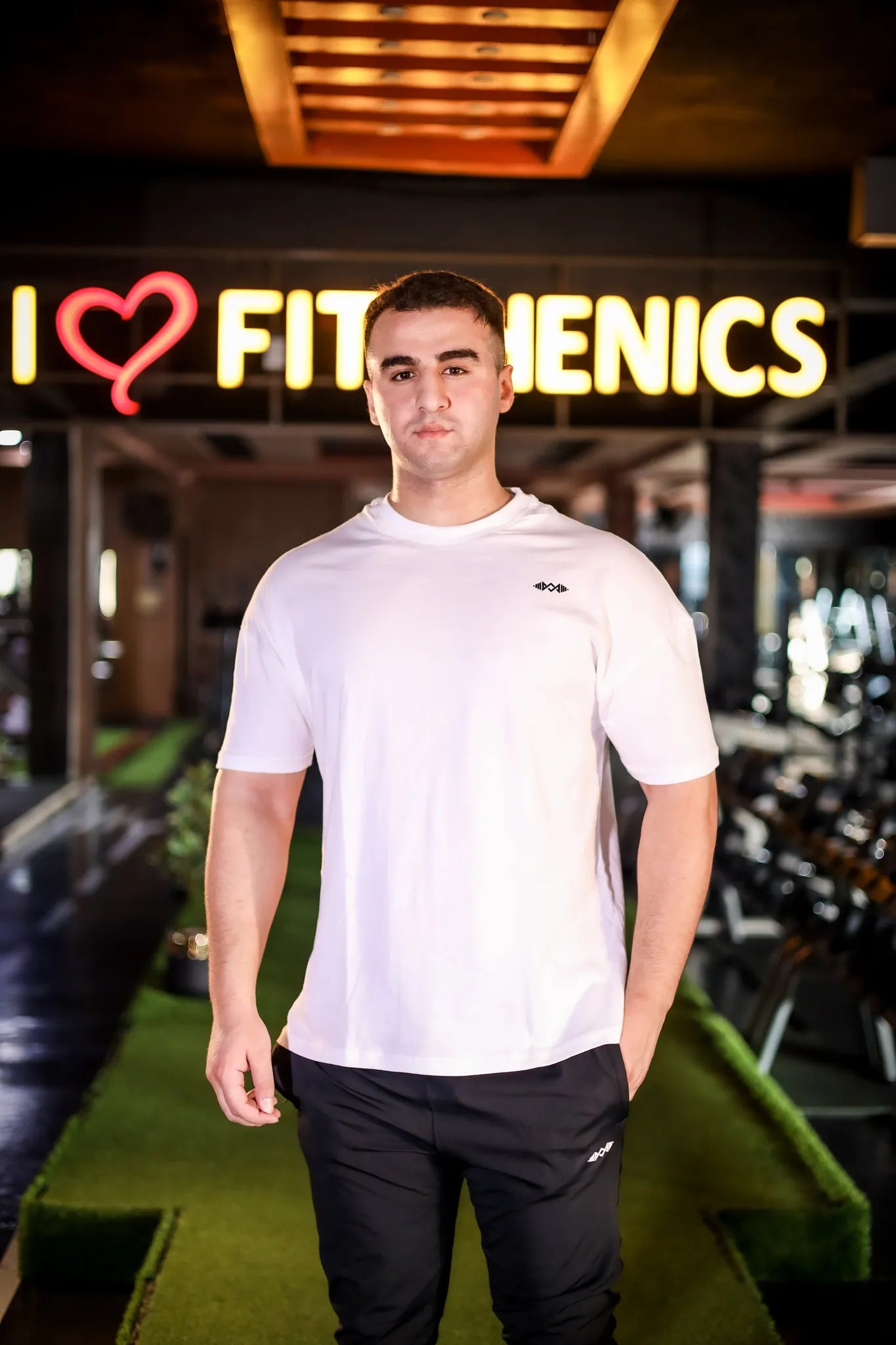 Front view of Murks Drop Shoulder Dripping T-shirt in  white, featuring a unique dripping design for a stylish look